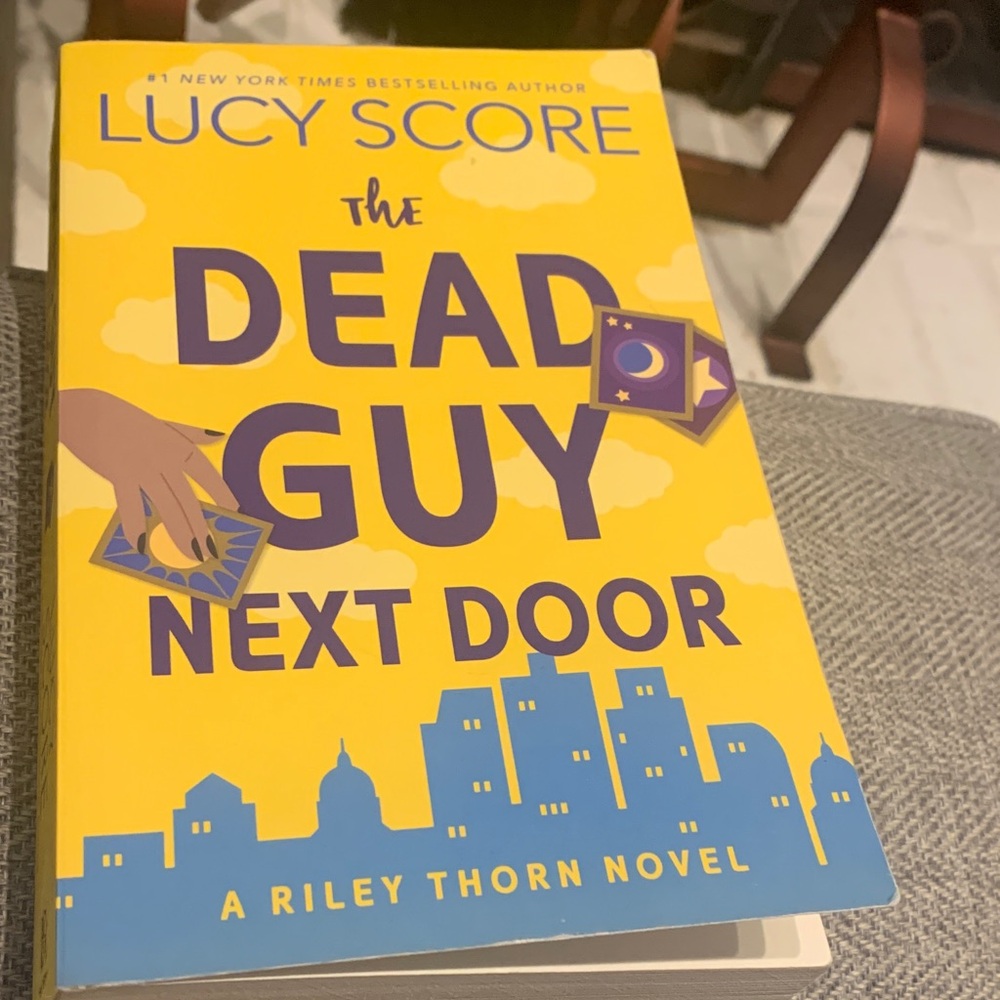 Yellow 'The Dead Guy Next Door' Book by